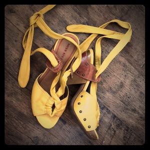 Yellow leather and wood heels